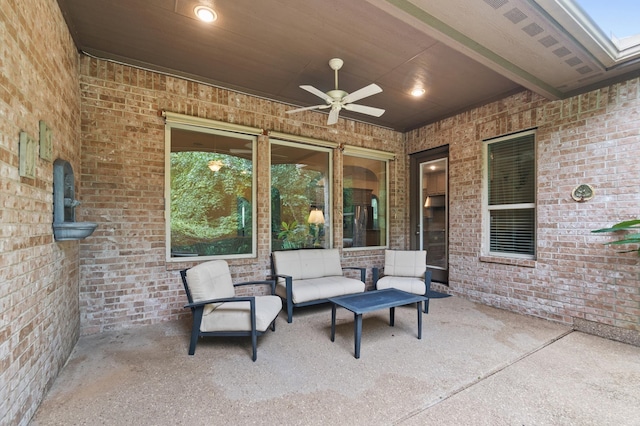 view of patio featuring ceiling fan