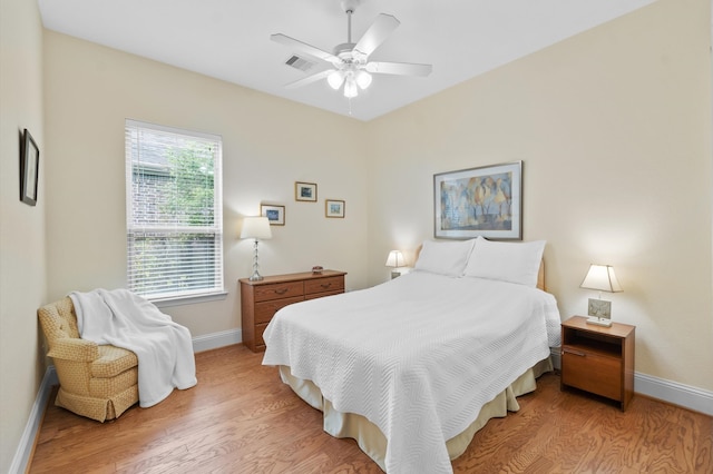 bedroom featuring ceiling fan and light wood-type flooring