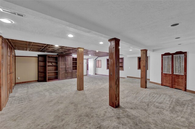 basement with light carpet