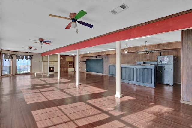 interior space featuring ceiling fan and hardwood / wood-style flooring