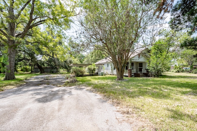 view of front of home with a front lawn