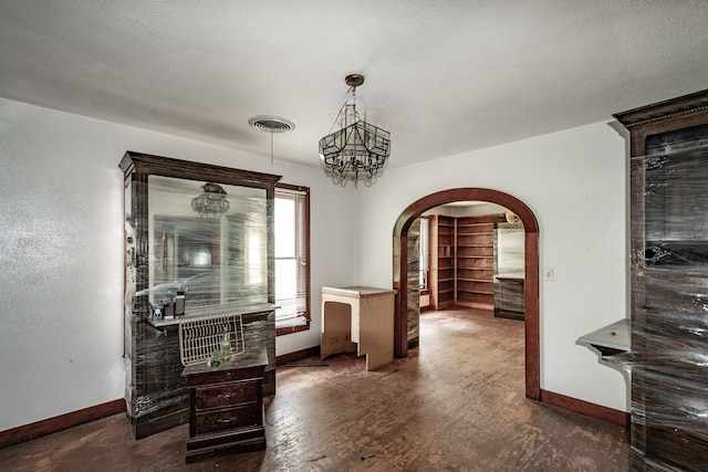 corridor featuring dark wood-type flooring