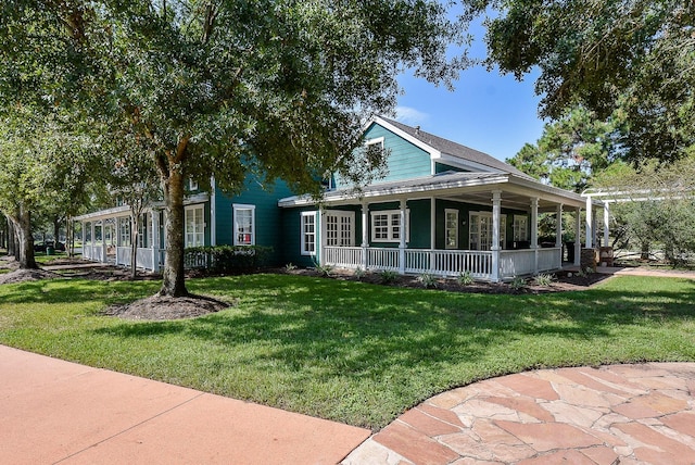 view of front of home with a porch and a front lawn