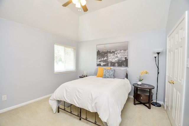 bedroom featuring ceiling fan, baseboards, vaulted ceiling, and carpet flooring