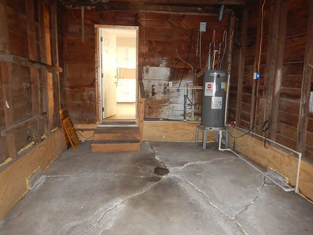 basement featuring electric water heater