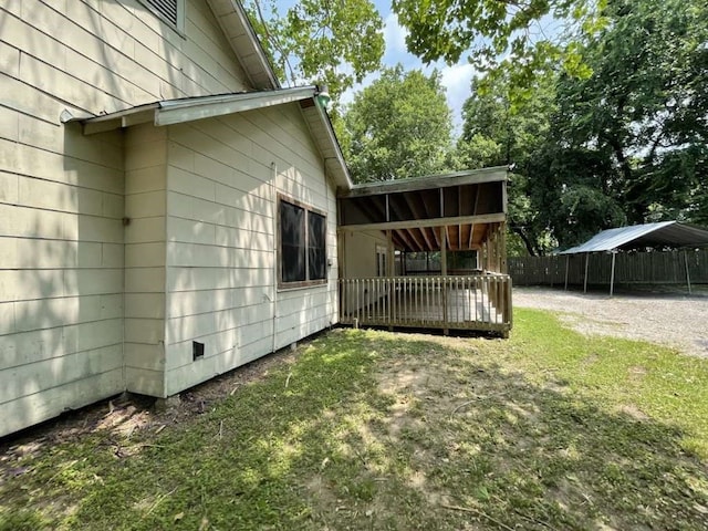 view of yard featuring a wooden deck