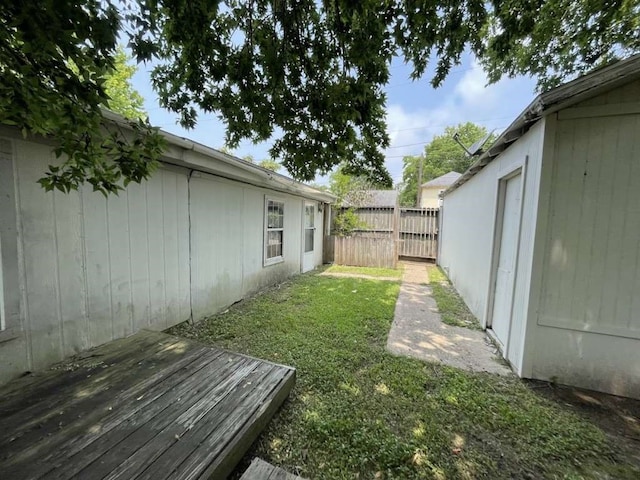 view of yard featuring a wooden deck