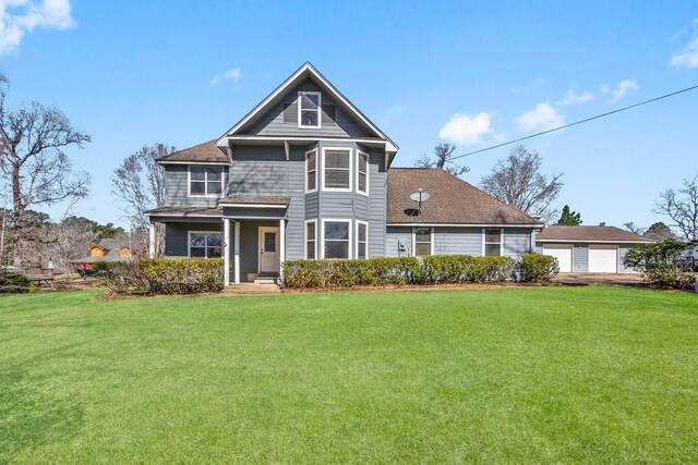 view of front of home featuring a front lawn