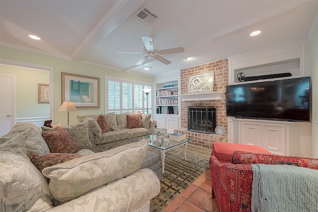 tiled living room featuring ceiling fan, built in shelves, brick wall, beam ceiling, and a fireplace