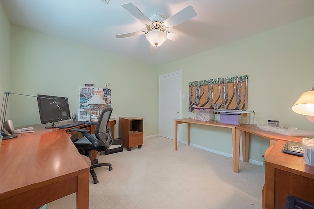 carpeted office with ceiling fan