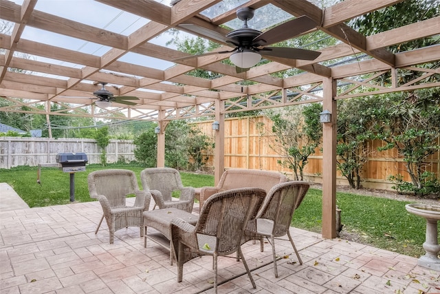 view of patio / terrace featuring ceiling fan, a pergola, and grilling area