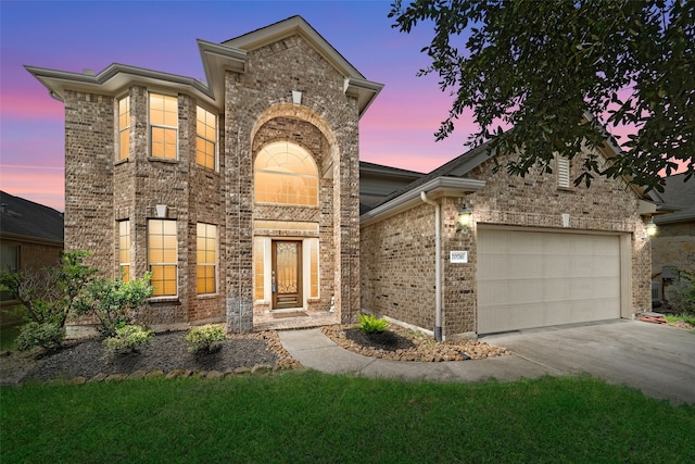 view of front of property with a garage