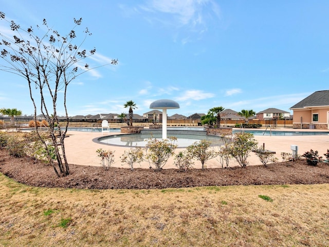 view of home's community with a pool