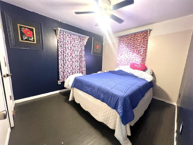 bedroom featuring ceiling fan and hardwood / wood-style flooring