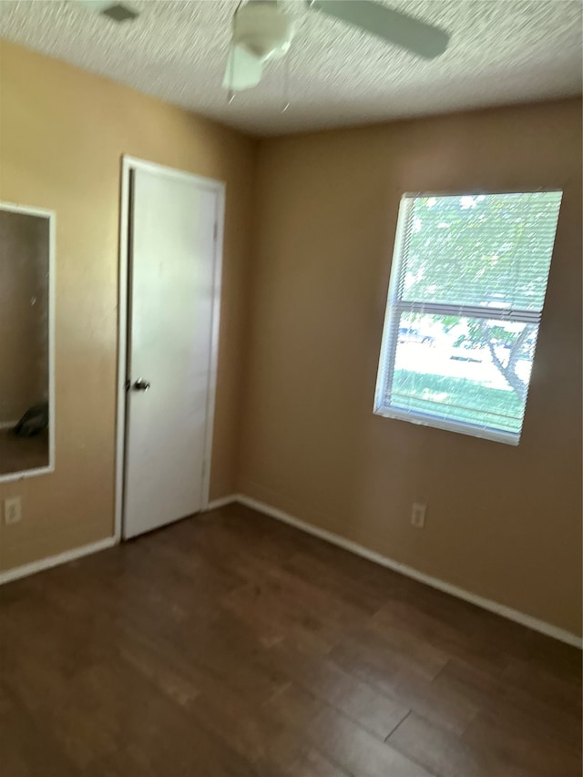 unfurnished room with ceiling fan