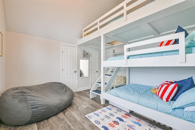 bedroom featuring wood finished floors