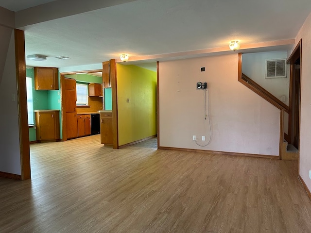 unfurnished living room featuring light hardwood / wood-style floors