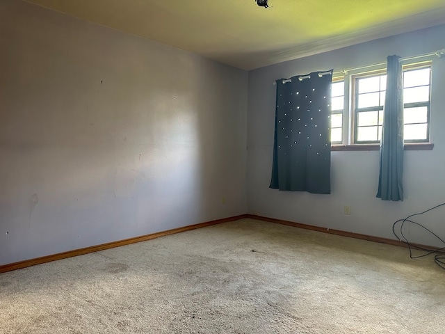 view of carpeted spare room