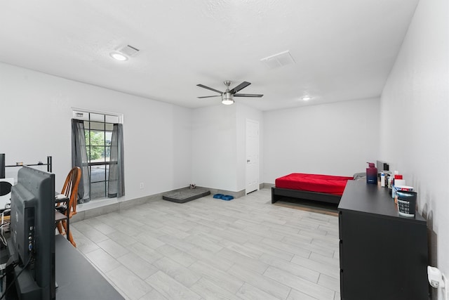 interior space featuring ceiling fan and light wood-type flooring