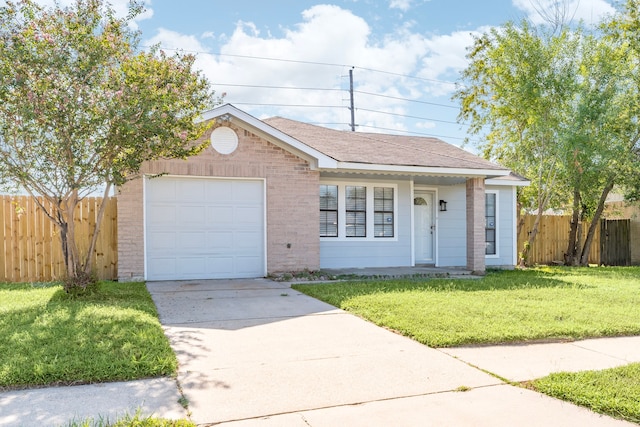 ranch-style house featuring a garage and a front yard