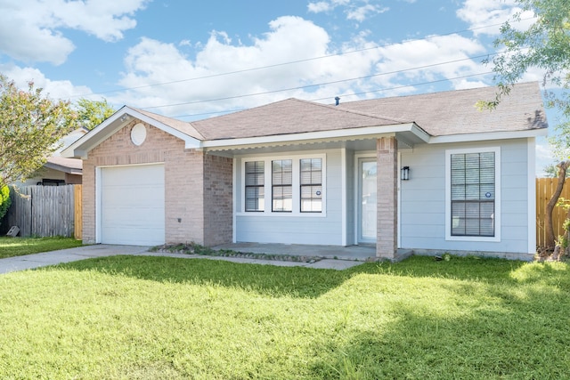 ranch-style home featuring a garage and a front yard