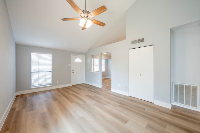 interior space featuring ceiling fan, light hardwood / wood-style flooring, and a healthy amount of sunlight