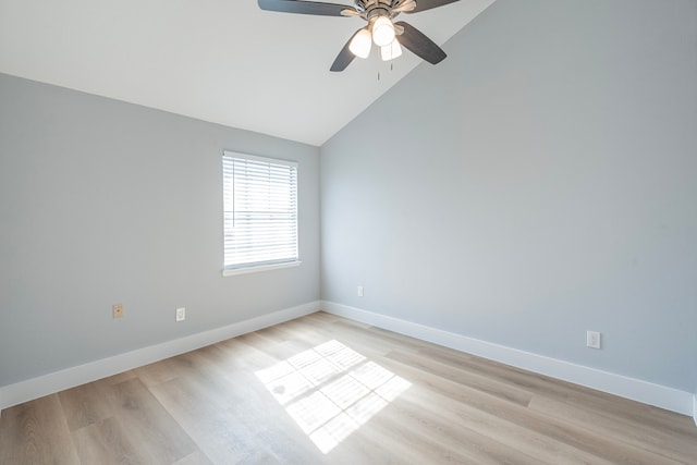 unfurnished room featuring ceiling fan, lofted ceiling, and light wood-type flooring