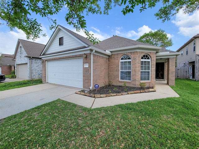 single story home featuring a garage and a front yard