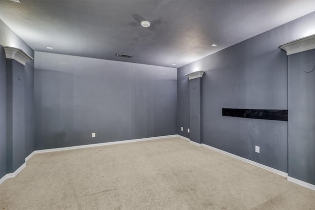 unfurnished room featuring carpet floors