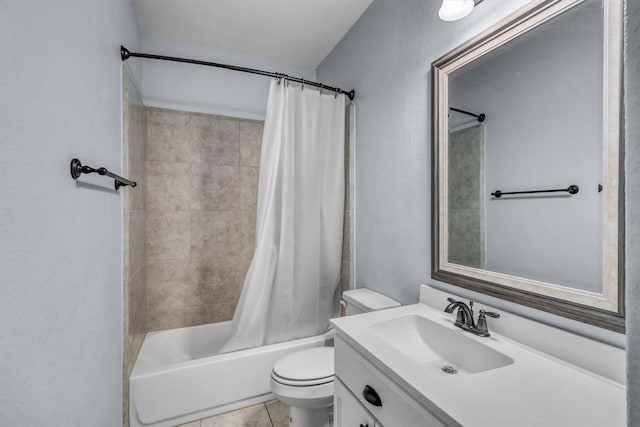 full bathroom featuring tile patterned flooring, shower / bath combo, vanity, and toilet