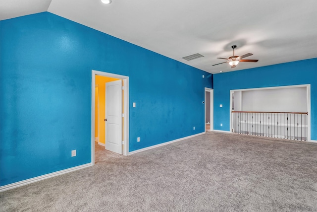 unfurnished bedroom featuring carpet floors, ceiling fan, and lofted ceiling