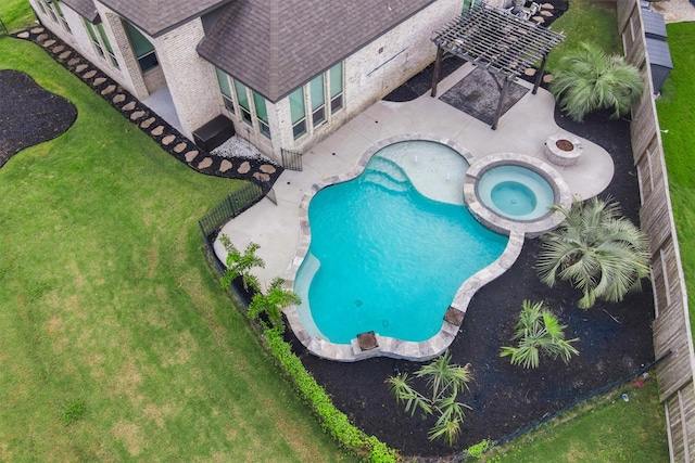 view of pool with an in ground hot tub and a patio area