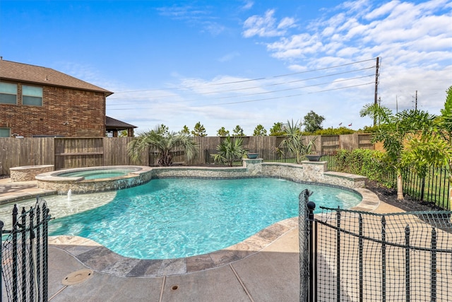 view of pool featuring an in ground hot tub and pool water feature