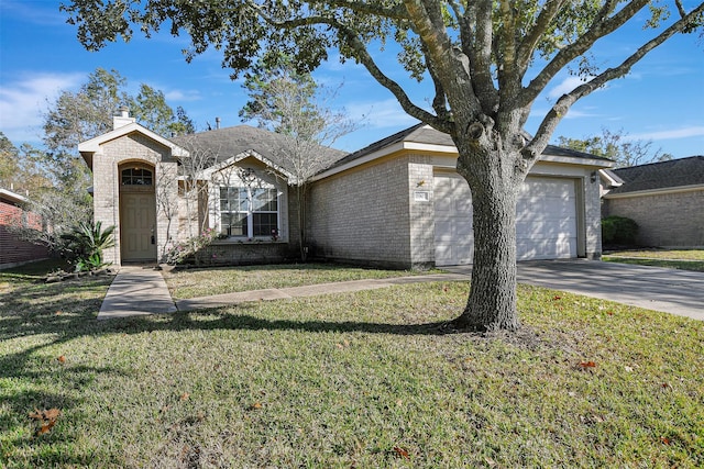 view of front of home featuring a garage and a front lawn