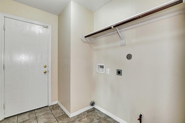 laundry area with hookup for an electric dryer, hookup for a washing machine, and gas dryer hookup