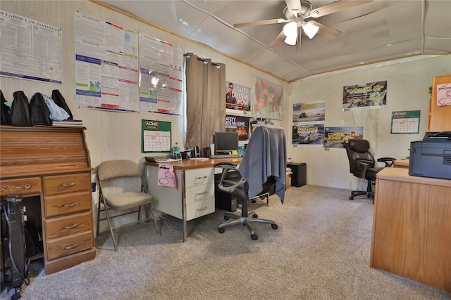 home office featuring ceiling fan, vaulted ceiling, and carpet flooring