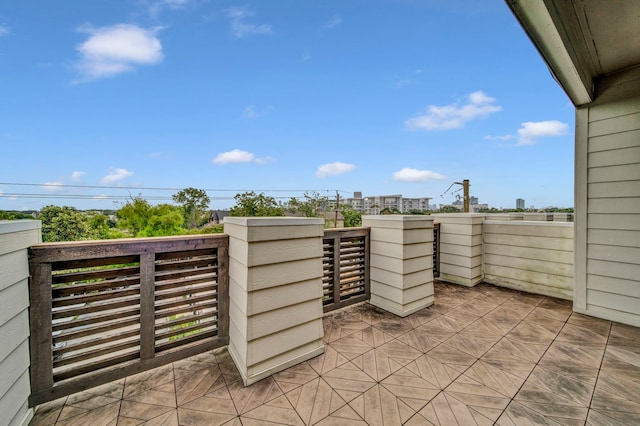 view of patio with a balcony