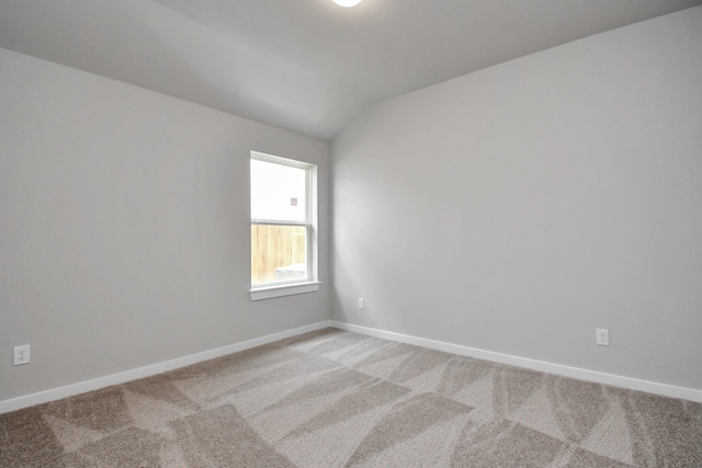 22022 Villa Terrace Dr, Hockley, TX 77447 - carpeted spare room featuring vaulted ceiling