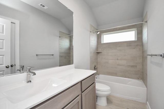 22022 Villa Terrace Dr, Hockley, TX 77447 - full bathroom with tiled shower / bath, toilet, vanity, and lofted ceiling