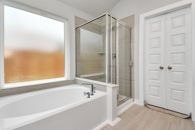 22022 Villa Terrace Dr, Hockley, TX 77447 - bathroom featuring plus walk in shower and tile patterned flooring