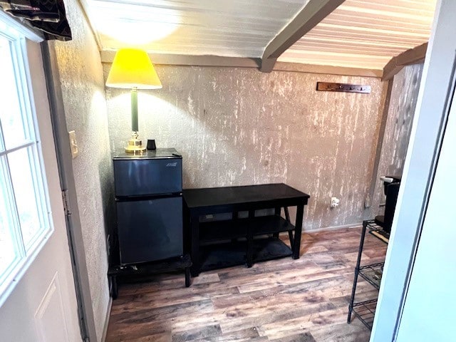 interior space featuring refrigerator and wood-type flooring