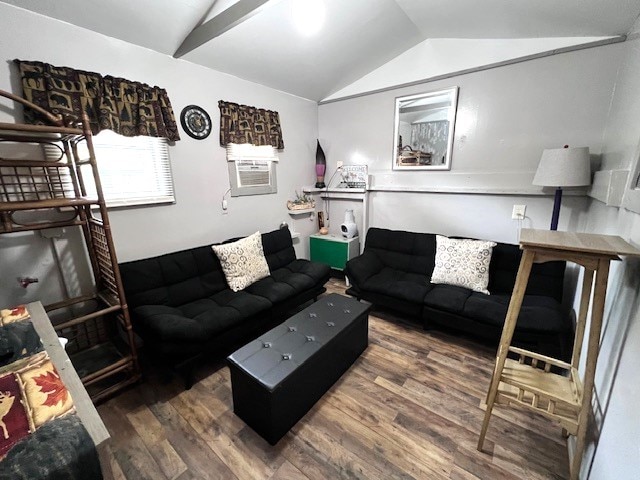 living room with lofted ceiling, cooling unit, and hardwood / wood-style flooring