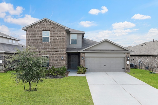 view of front facade featuring central AC unit, a front yard, and a garage