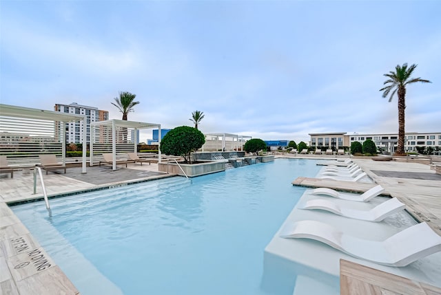 view of swimming pool featuring a patio