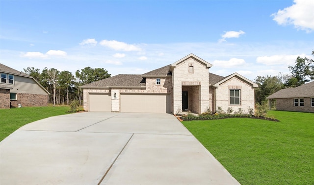 view of front of house with a garage and a front lawn