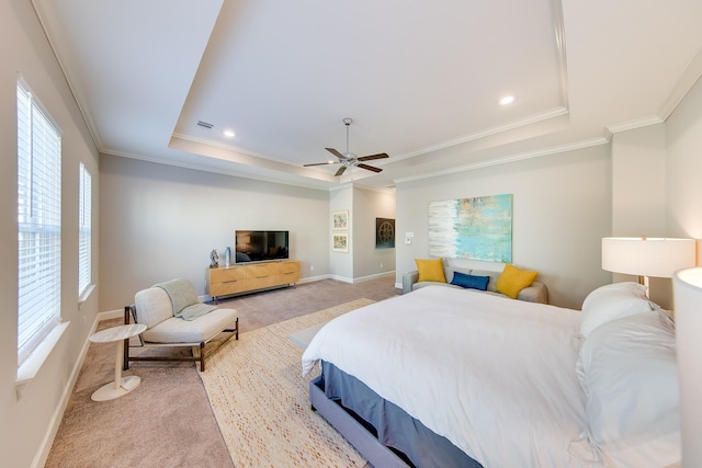 bedroom featuring recessed lighting, light colored carpet, baseboards, ornamental molding, and a tray ceiling