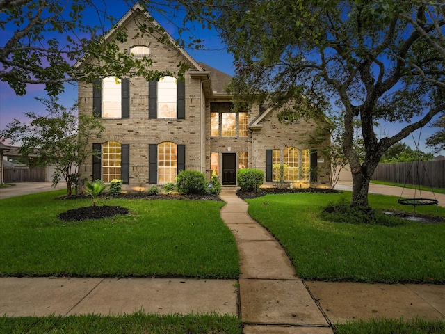 view of front facade with a lawn