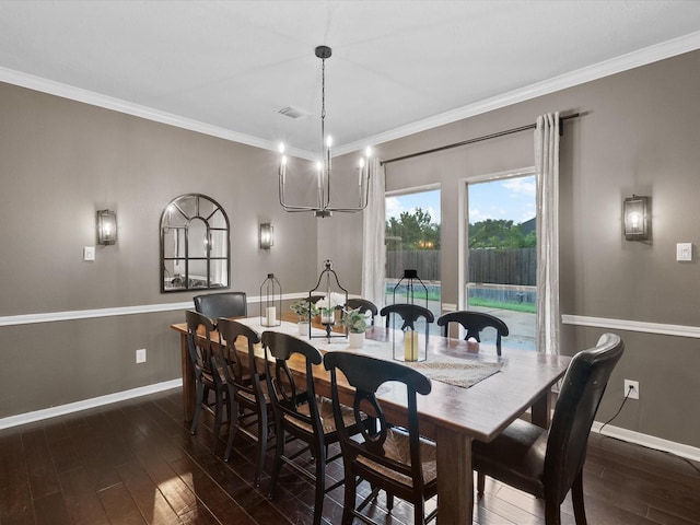 dining space with ornamental molding, a notable chandelier, and dark hardwood / wood-style flooring