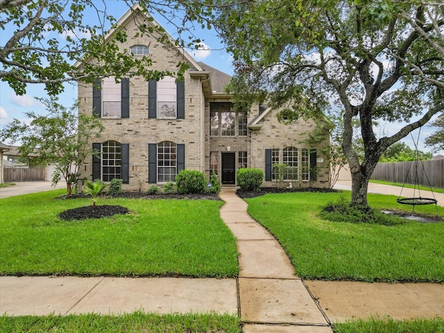 view of front of property with a front lawn