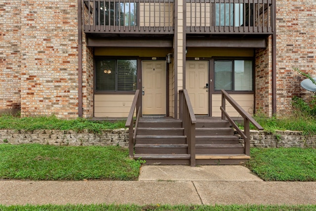 property entrance with a balcony